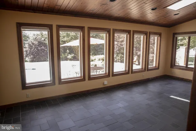 a bathroom with a sink a mirror and a bathtub