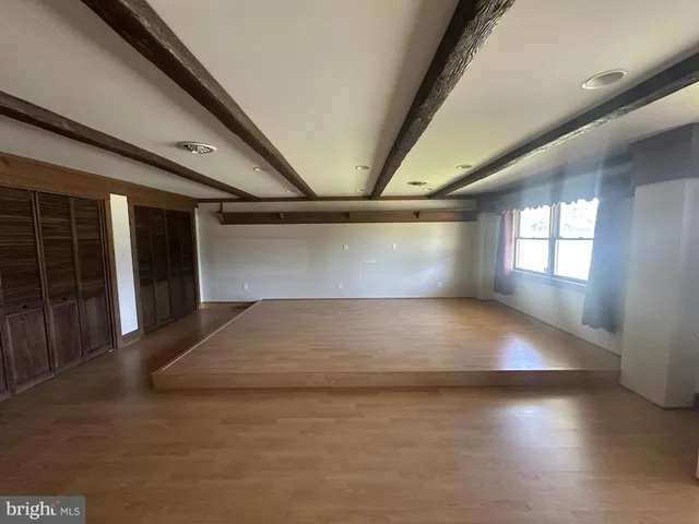 a view of a room with utility and a sink