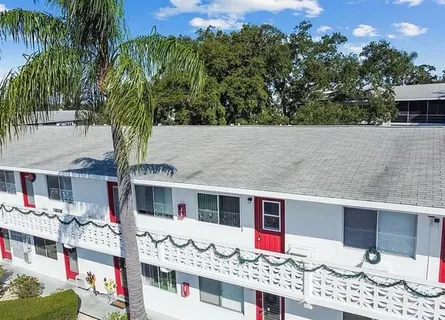 a terrace of a house with outdoor seating