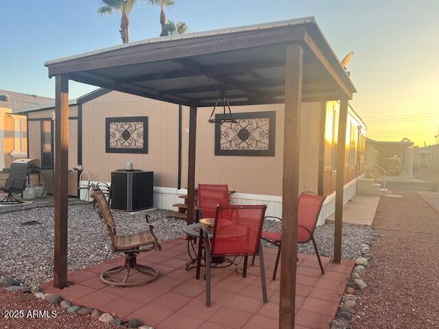 301 South Signal Butte Road, Unit 233 Apache Junction, AZ 85120 - Photo 5 of 22 a view of a dining room with furniture window and outside view