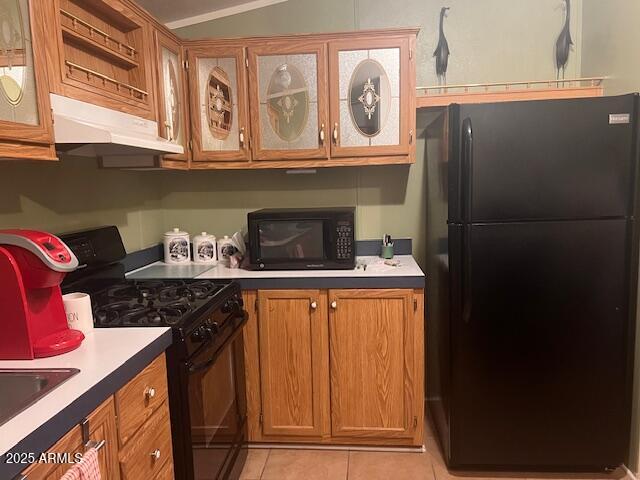301 South Signal Butte Road, Unit 233 Apache Junction, AZ 85120 - Photo 9 of 22 a kitchen with stainless steel appliances granite countertop a refrigerator and a stove