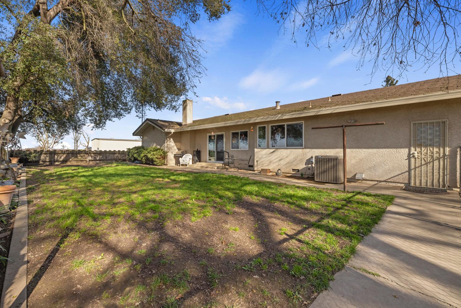 24836 Arthur Road Escalon, CA 95320 - Photo 36 of 47 a view of a house with a yard