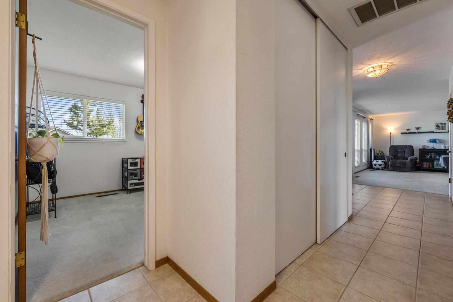 24836 Arthur Road Escalon, CA 95320 - Photo 9 of 47 a view of a livingroom with furniture and a window