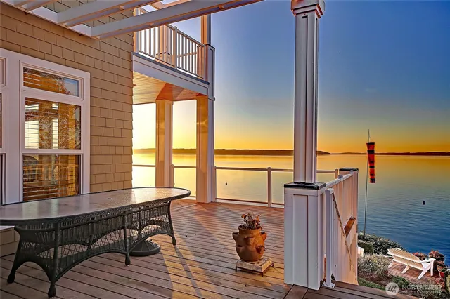 a view of balcony with floor to ceiling window wooden floor