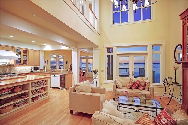 a kitchen with stainless steel appliances granite countertop a sink and cabinets