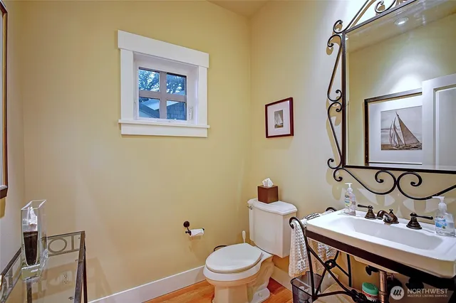 a view of entryway with wooden floor and stairs