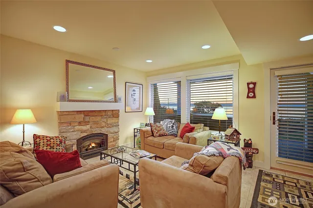 a kitchen with a sink a refrigerator and cabinets