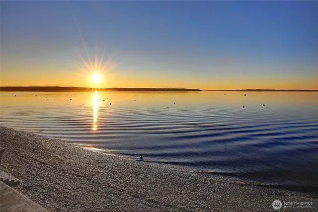 a front view of a house with a garage