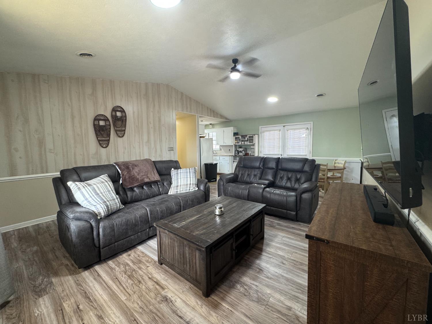 3363 Horseshoe Road Appomattox, VA 24522 - Photo 4 of 15 a living room with furniture and a flat screen tv