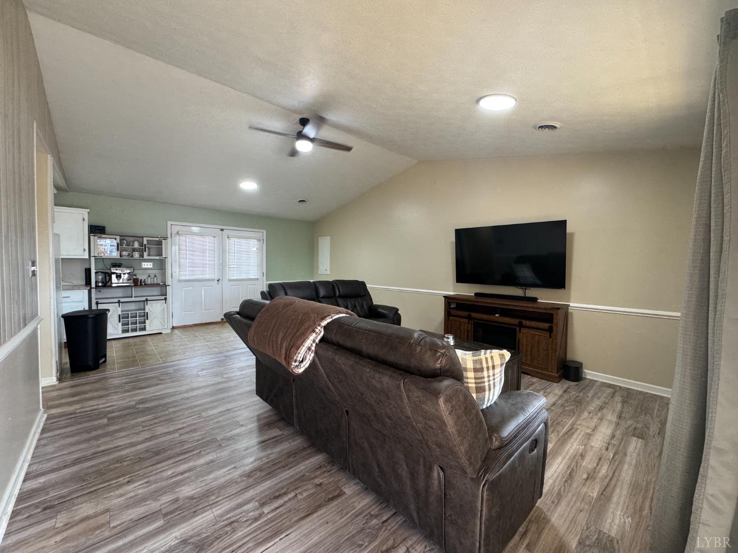 3363 Horseshoe Road Appomattox, VA 24522 - Photo 5 of 15 a living room with furniture and a flat screen tv