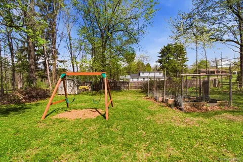 a view of playground with a slide