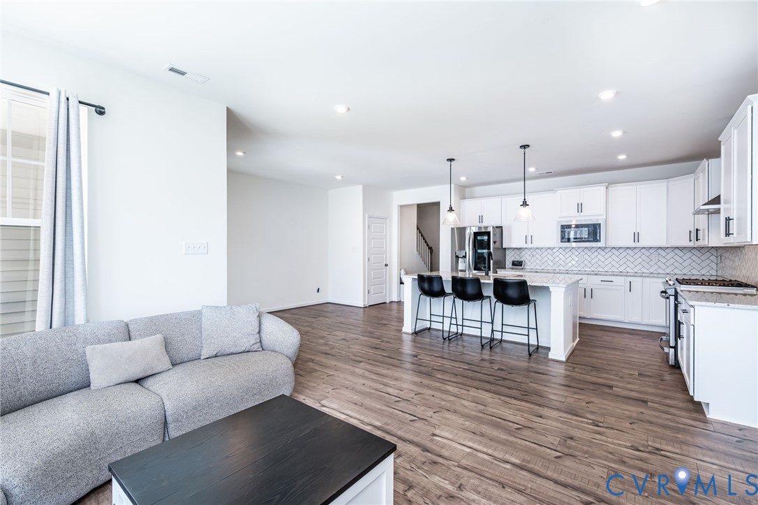 18521 Palisades Ridge Moseley, VA 23120 - Photo 12 of 32 Living room and kitchen