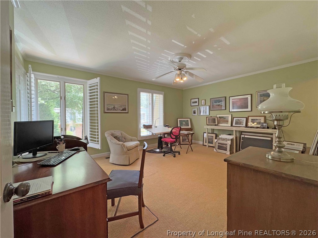 190 Palmetto Road Pinehurst, NC 28374 - Photo 17 of 19 a living room with furniture and a flat screen tv