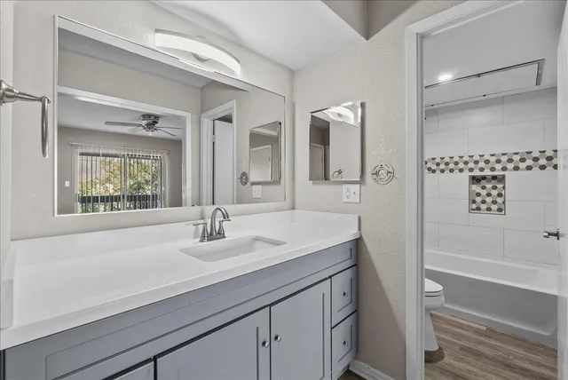 a bathroom with a sink and a bathtub