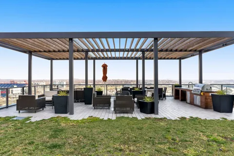 a view of swimming pool with outdoor seating