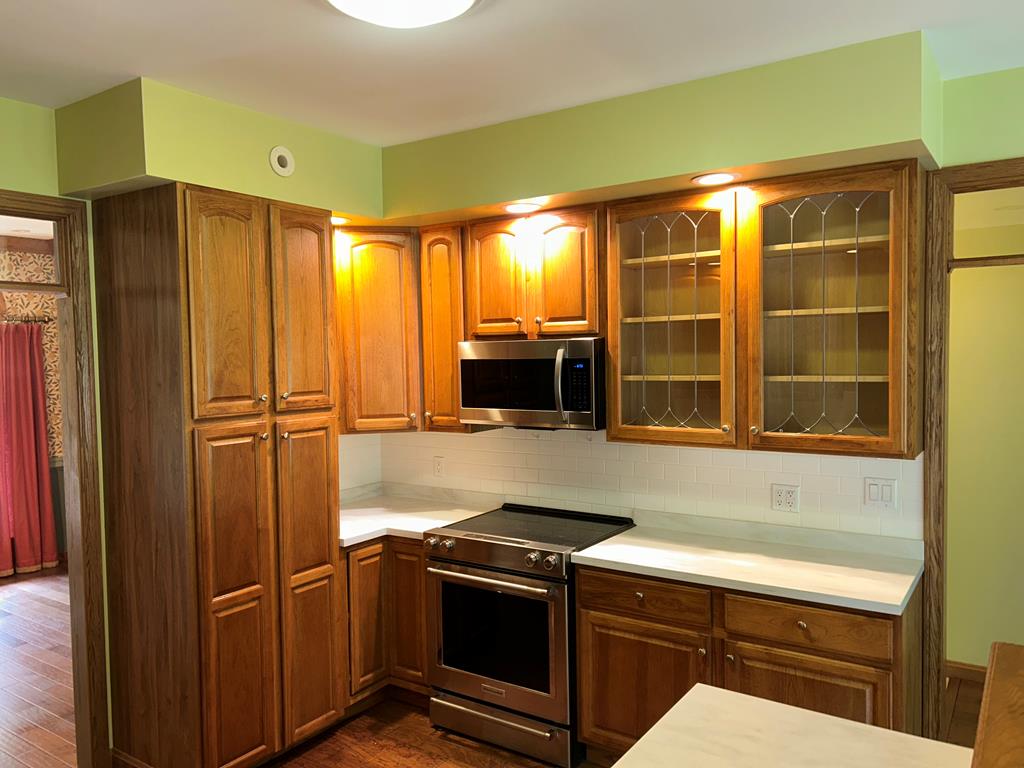 114 Oak Ridge Drive Clarion, PA 16214 - Photo 5 of 38 a kitchen with stainless steel appliances granite countertop a refrigerator and a sink