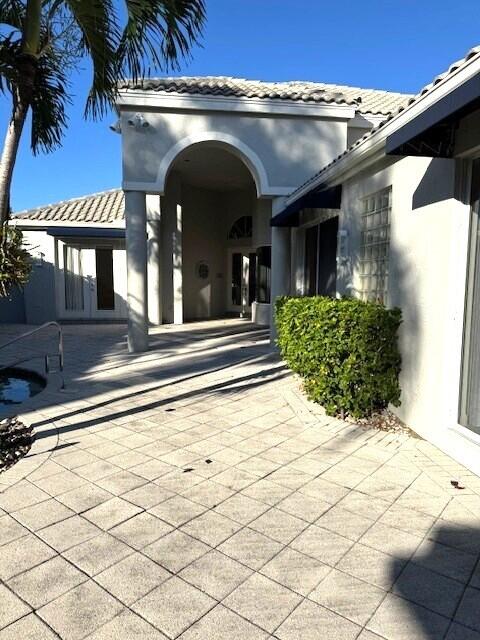 3529 Northwest Clubside Circle Boca Raton, FL 33496 - Photo 3 of 11 Courtyard Entry