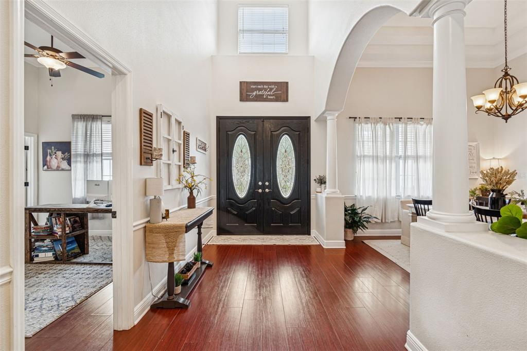 3077 Cork Road Plant City, FL 33565 - Photo 11 of 99 a living room with furniture window and wooden floor