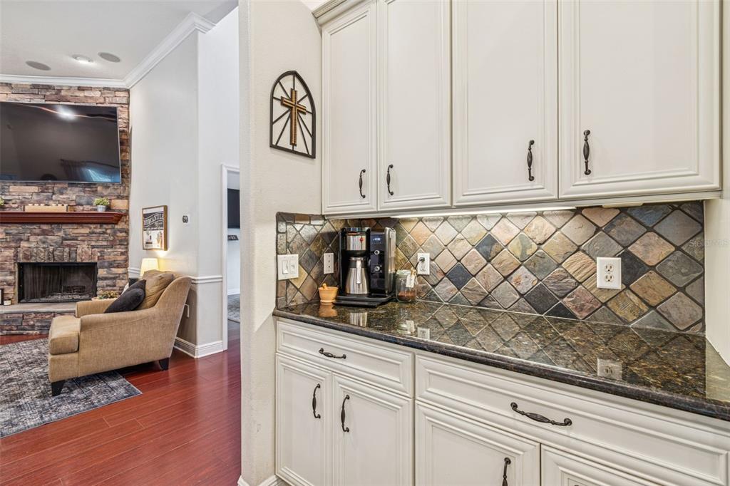 3077 Cork Road Plant City, FL 33565 - Photo 28 of 99 a living room with furniture and a flat screen tv