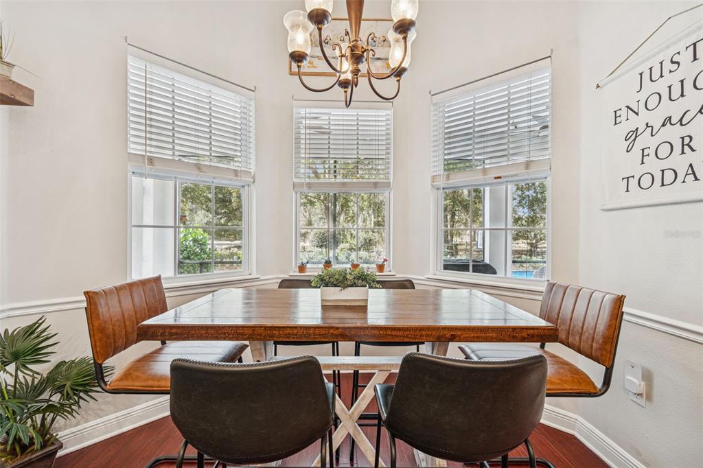 3077 Cork Road Plant City, FL 33565 - Photo 30 of 99 a view of a dining room with furniture window and outside view