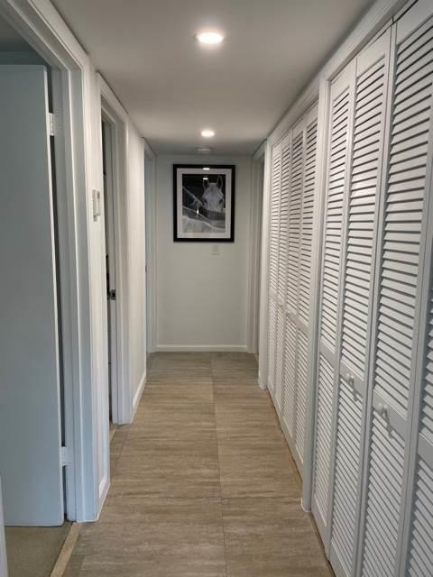 13400 Polo Road West Wellington, FL 33414 - Photo 7 of 16 a view of hallway with wooden floor