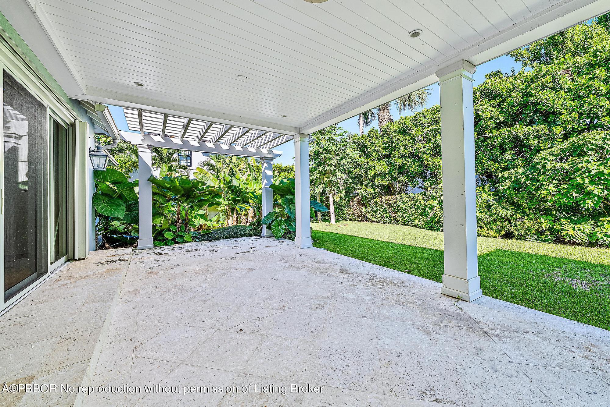 111 Reef Road Palm Beach, FL 33480 - Photo 16 of 28 a view of backyard with green space