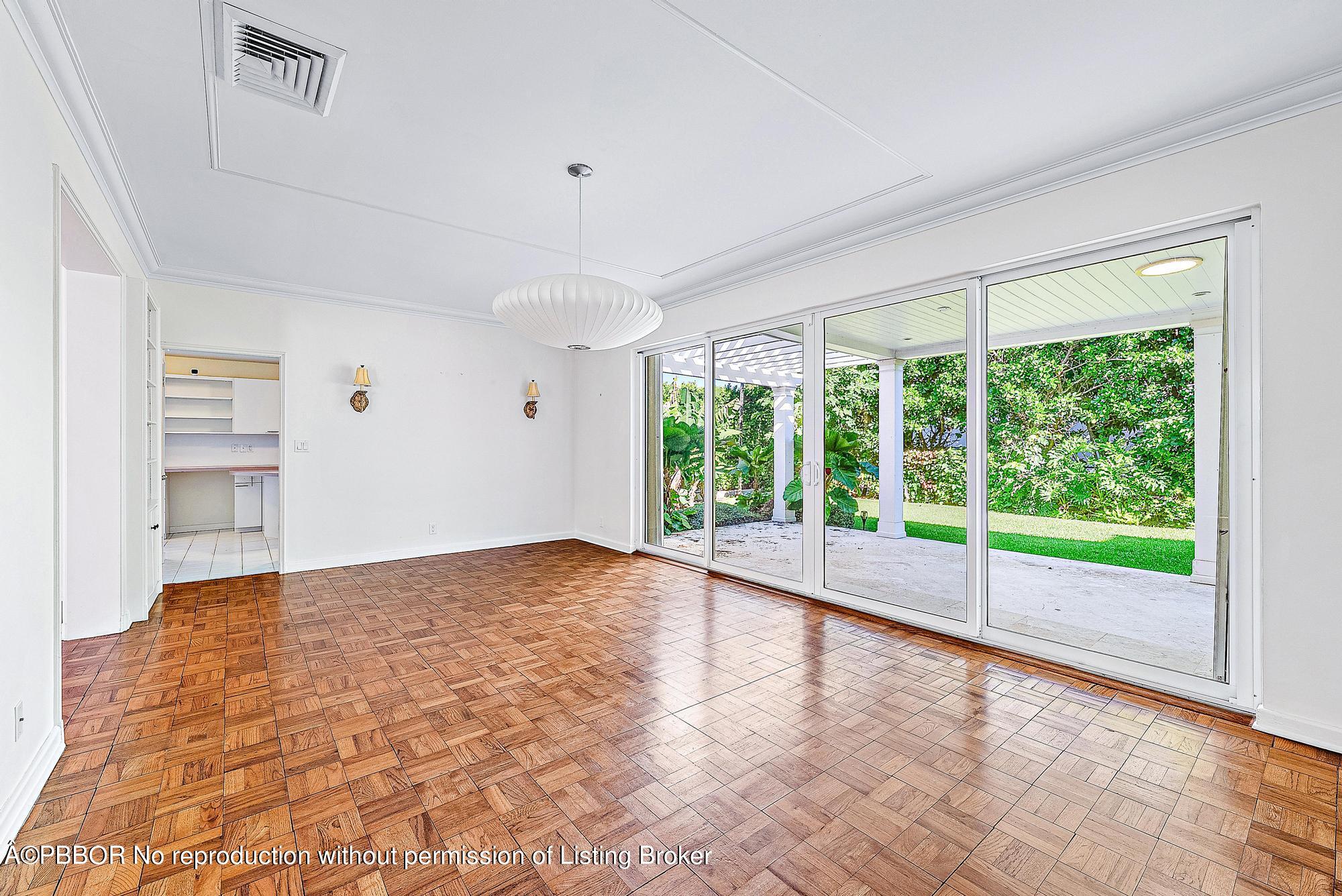 111 Reef Road Palm Beach, FL 33480 - Photo 7 of 28 a view of an empty room with a window