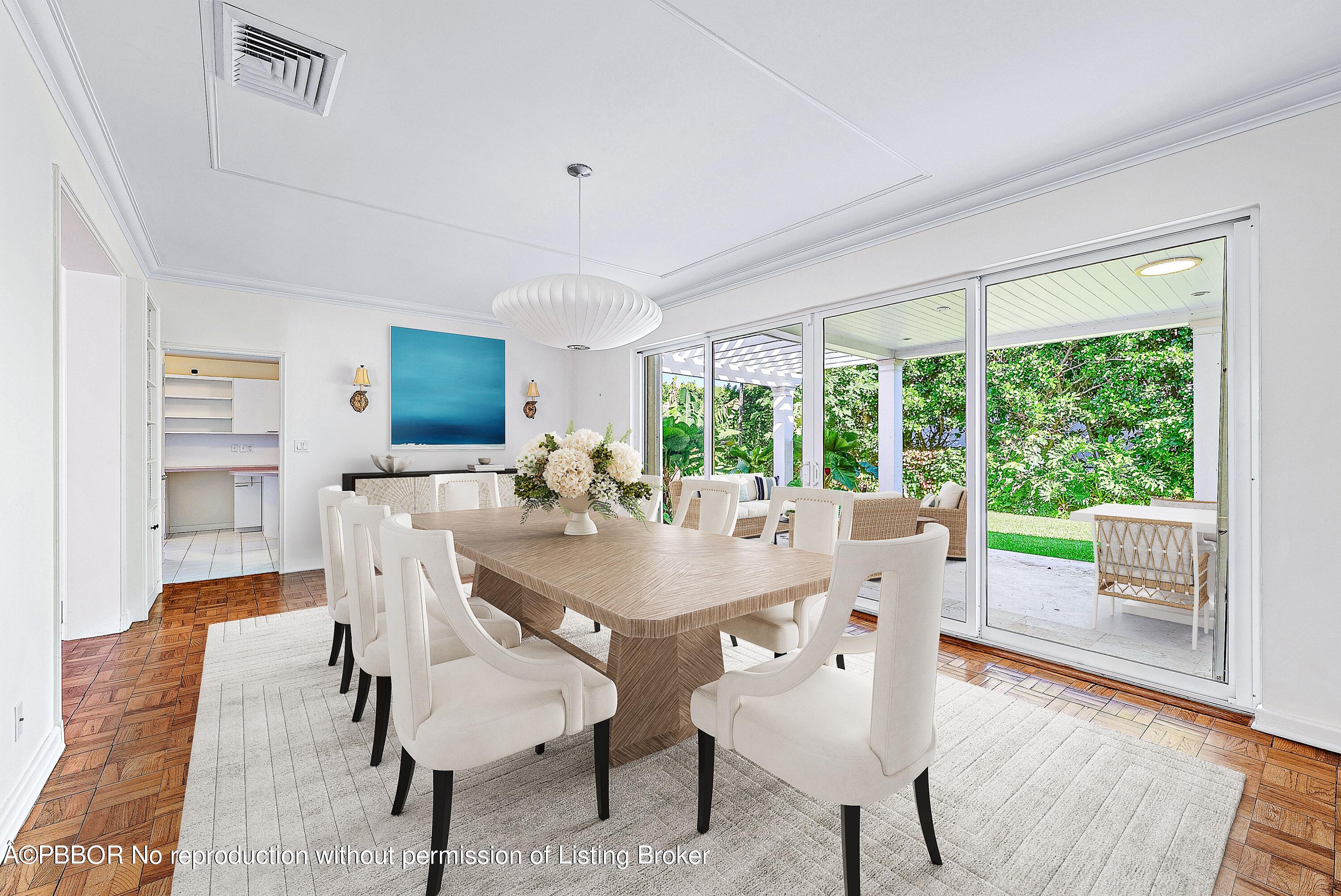 111 Reef Road Palm Beach, FL 33480 - Photo 8 of 28 a view of a dining room with furniture window and wooden floor