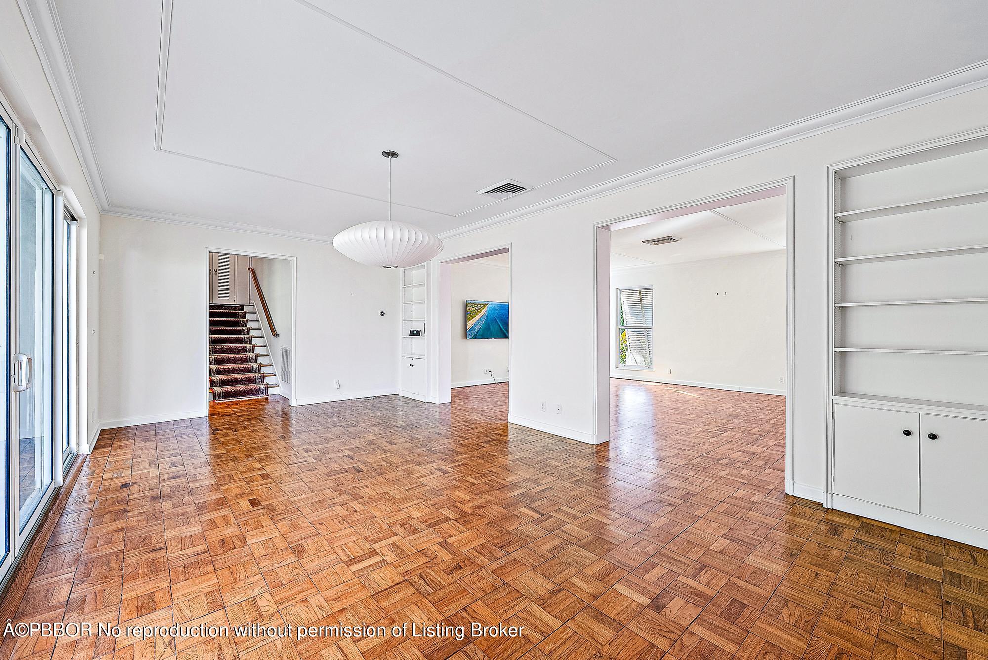 111 Reef Road Palm Beach, FL 33480 - Photo 9 of 28 a view of an empty room with stairs and ventilation