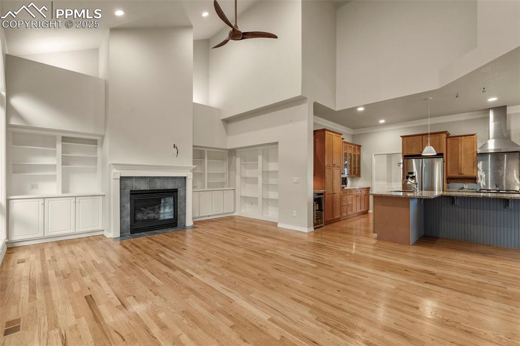 4930 Langdale Way Colorado Springs, CO 80906 - Photo 11 of 49 a view of a kitchen with a sink and a fireplace