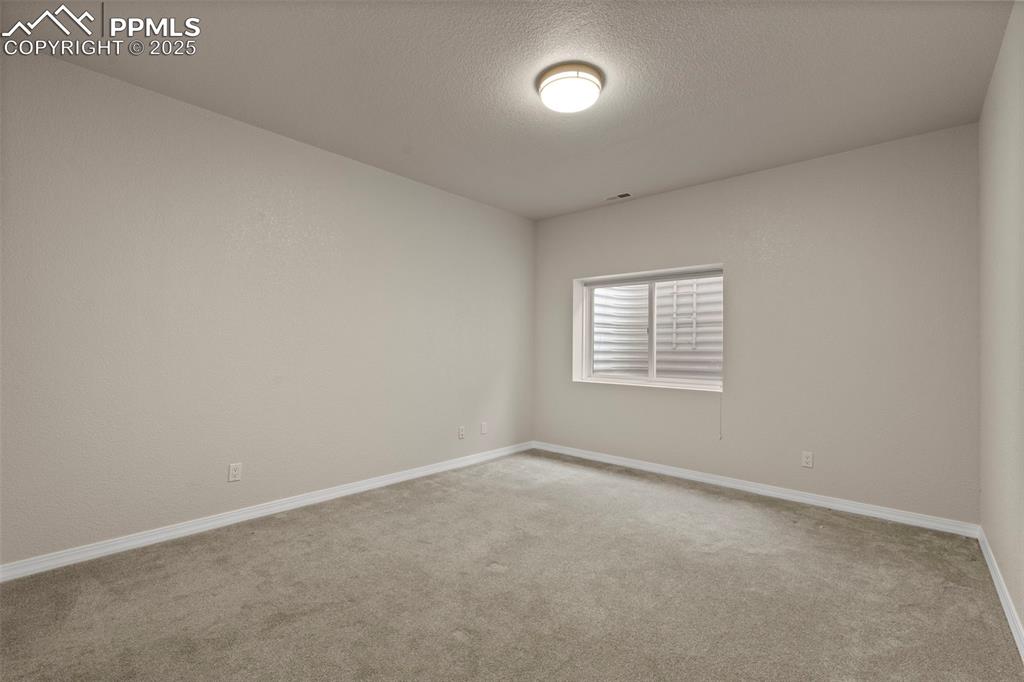 4930 Langdale Way Colorado Springs, CO 80906 - Photo 42 of 49 an empty room with a window