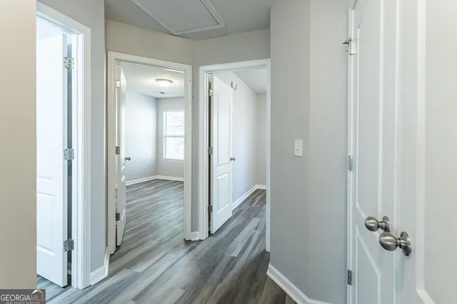 a view of a bathroom from the hallway
