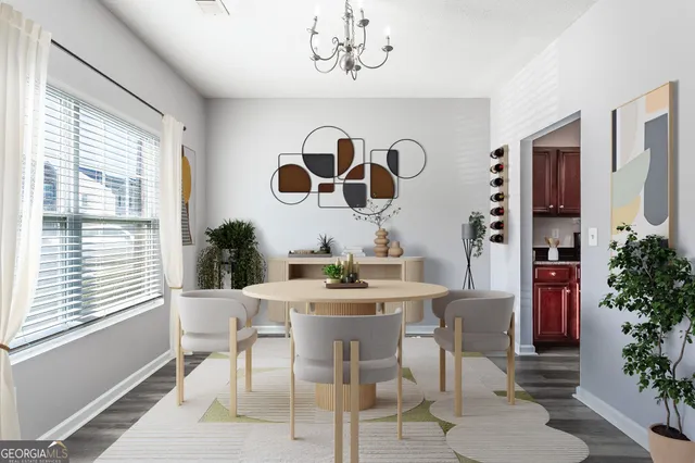 a view of a dining room with furniture window and outside view