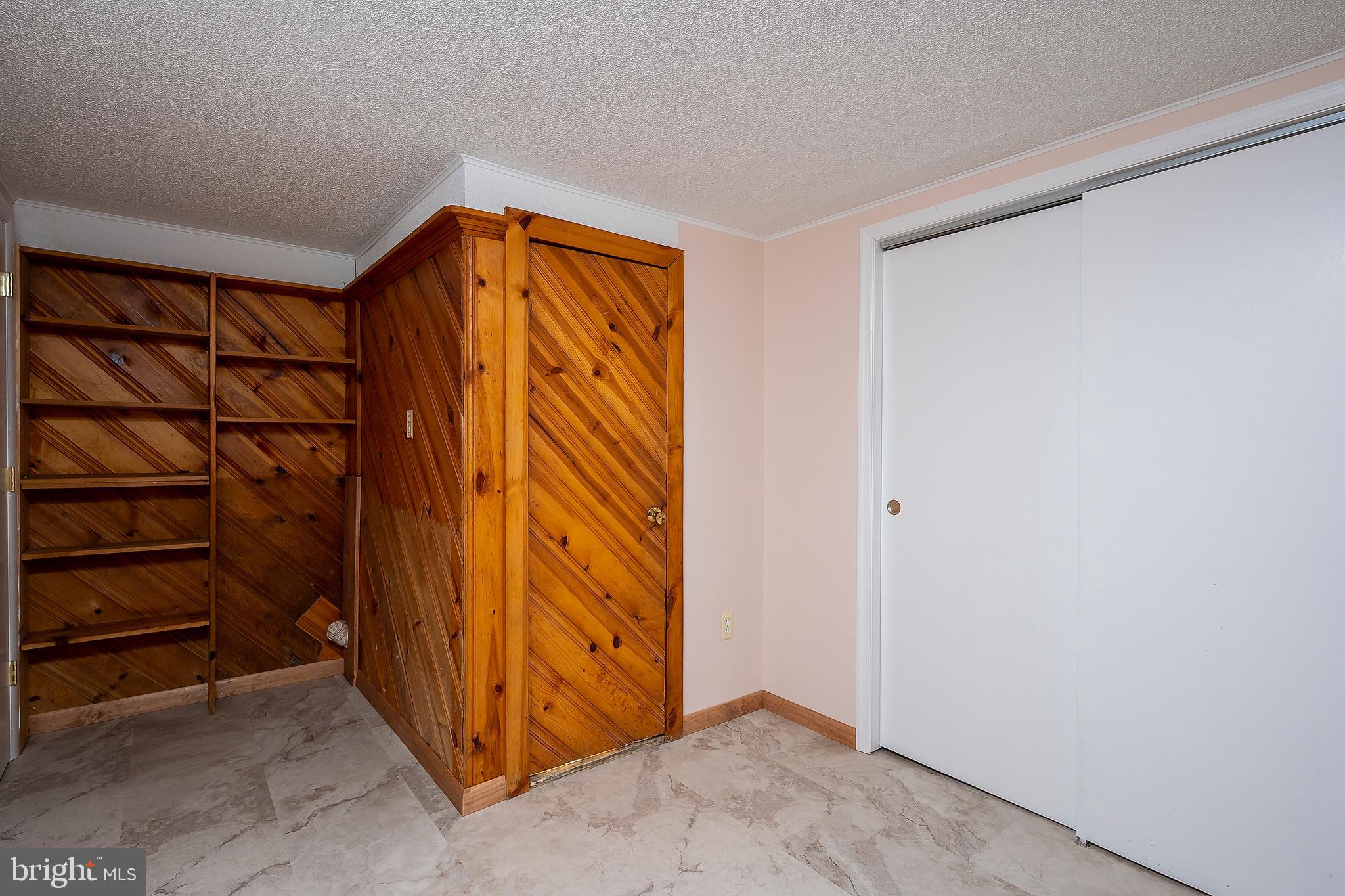 102 Westowne Road Baltimore, MD 21229 - Photo 21 of 31 Bedroom 4 w/built-in shelving