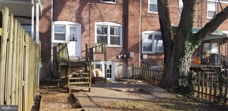 102 Westowne Road Baltimore, MD 21229 - Photo 27 of 31 The rear yard features a deck and some patio space
