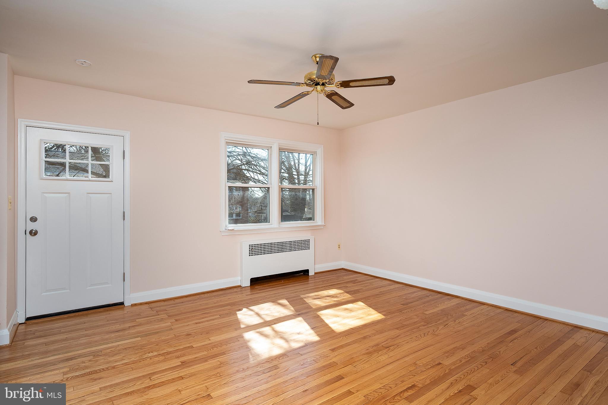 102 Westowne Road Baltimore, MD 21229 - Photo 5 of 31 The Living Room has real hardwood floors