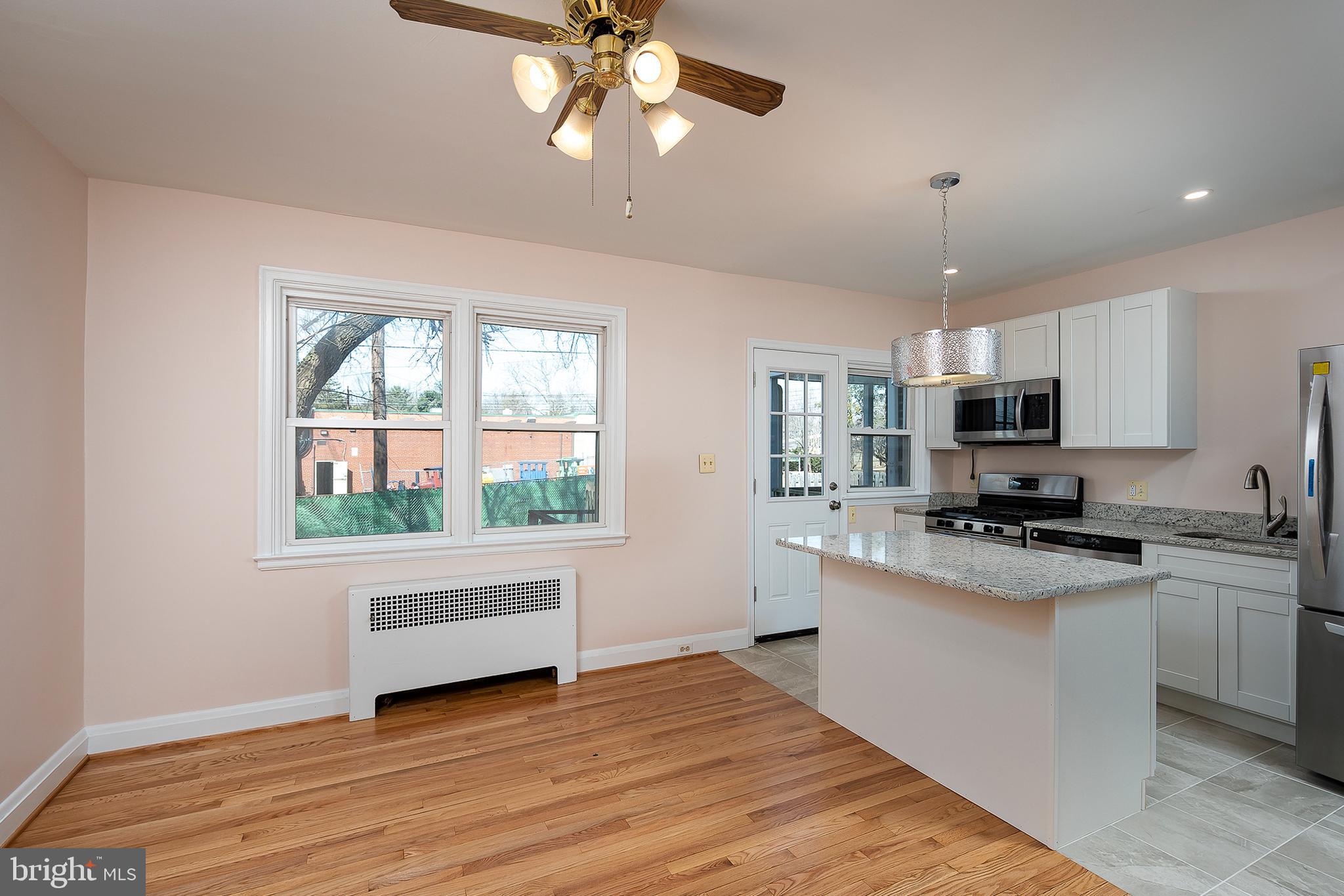 102 Westowne Road Baltimore, MD 21229 - Photo 9 of 31 The Dining Area to Kitchen has been opened up