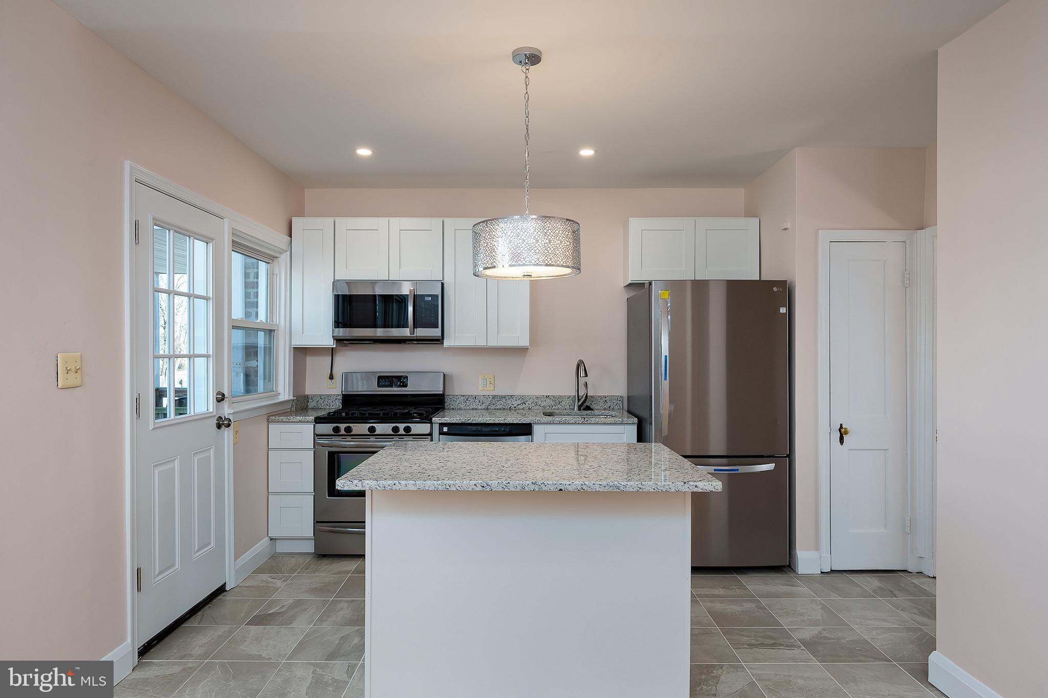 102 Westowne Road Baltimore, MD 21229 - Photo 10 of 31 A center island w/breakfast bar has been added