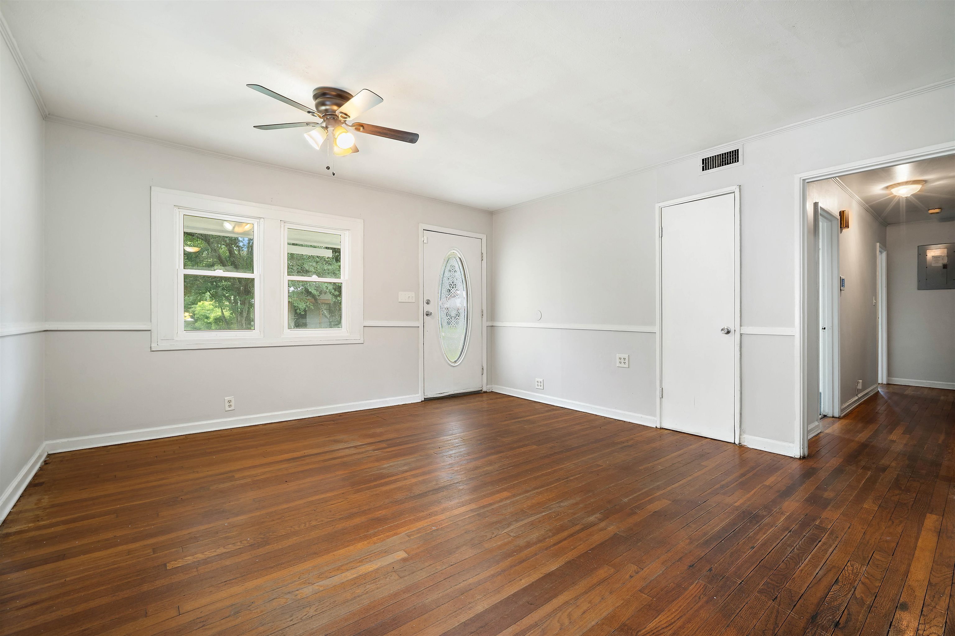 3014 Farcott Street Mobile, AL 36606 - Photo 6 of 26 Entrance foyer featuring dark wood-type flooring, ceiling fan, and electric panel