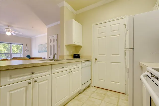 a spacious bathroom with a sink and a mirror