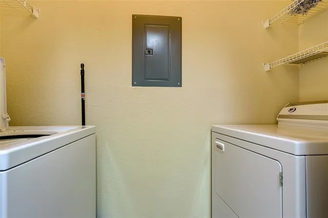 a utility room with dryer and washer