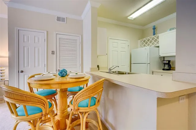 a spacious bathroom with a granite countertop sink and a mirror