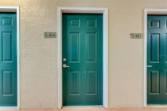 a view of door with yard