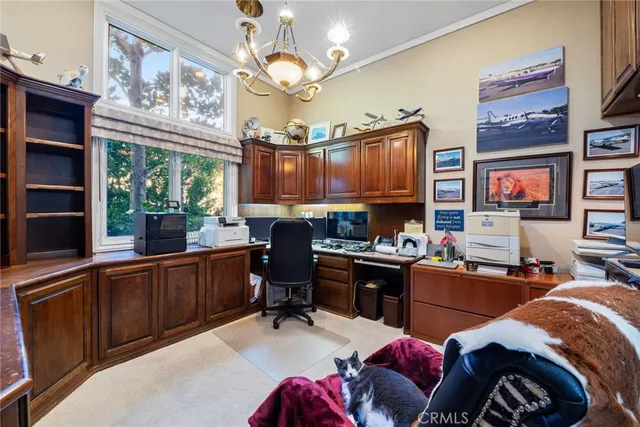 a workspace with workspace a window and a flat screen tv