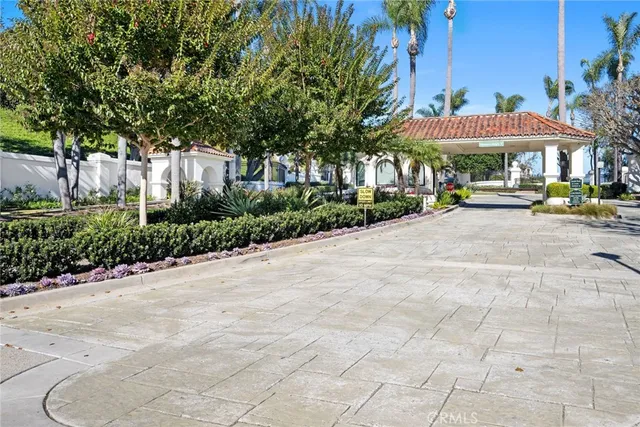 a view of a street with houses on both side