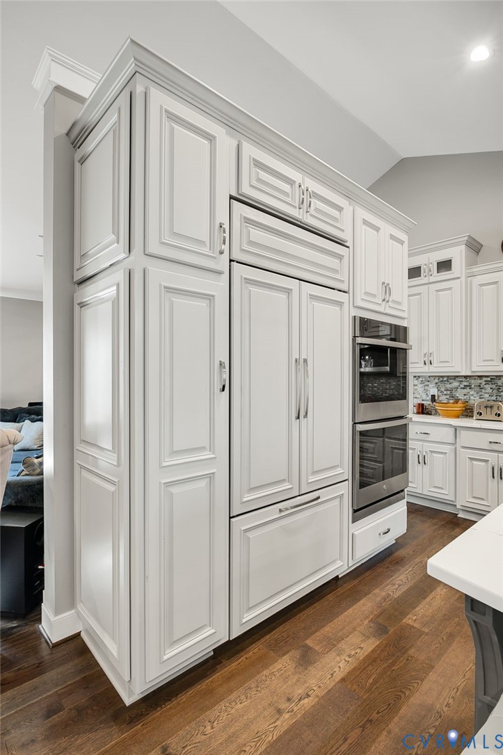 15330 Wilkinson Road Dinwiddie, VA 23841 - Photo 12 of 43 a kitchen with white cabinets and stainless steel appliances