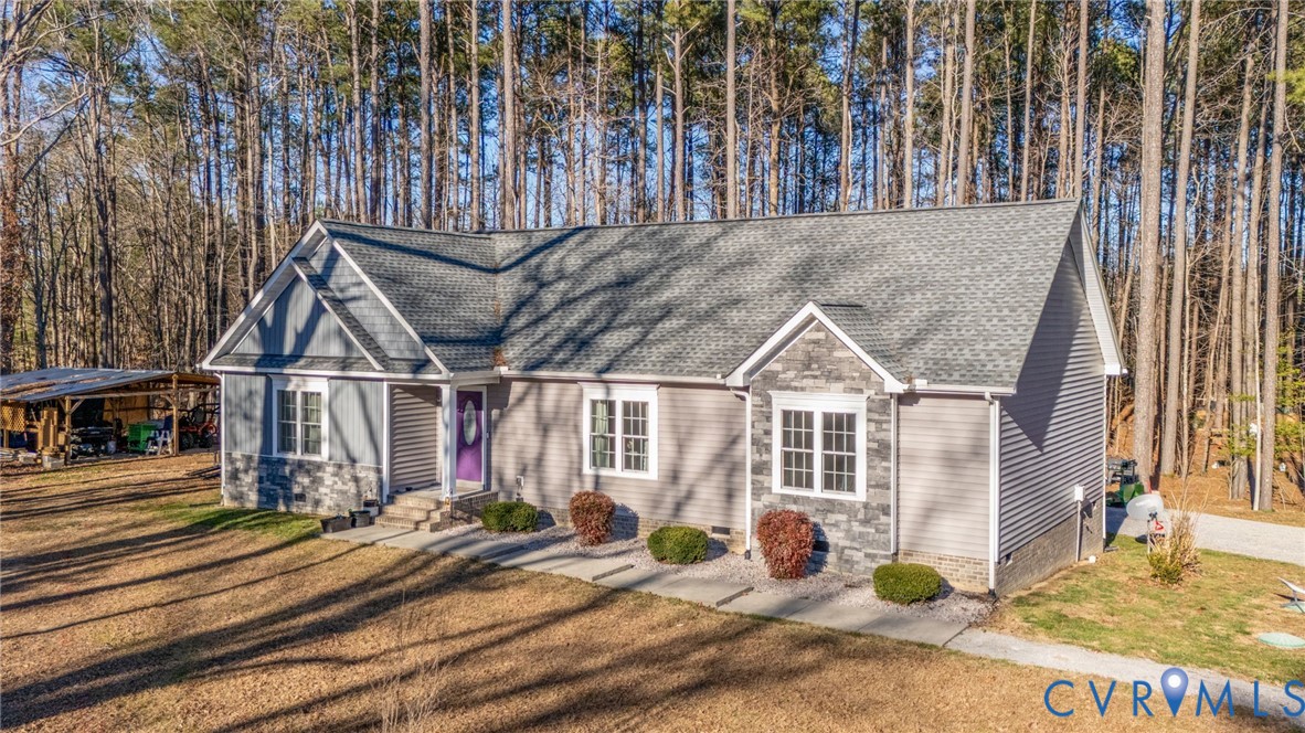 15330 Wilkinson Road Dinwiddie, VA 23841 - Photo 23 of 43 a view of a house with wooden fence