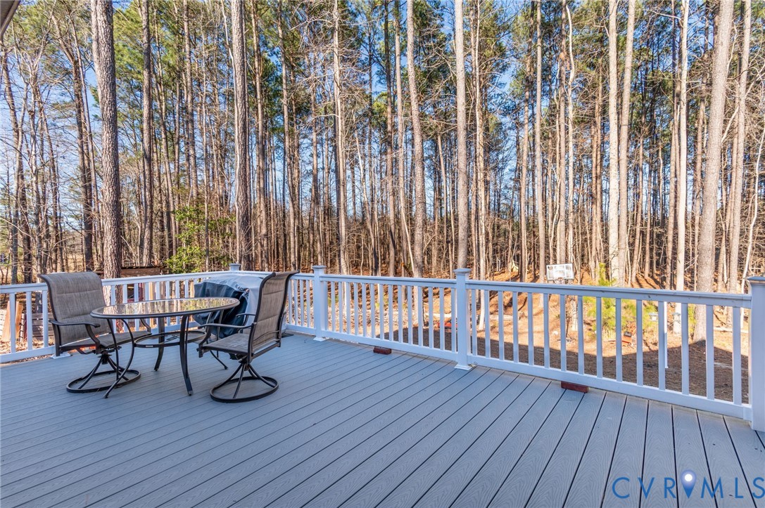 15330 Wilkinson Road Dinwiddie, VA 23841 - Photo 24 of 43 a view of balcony with wooden floor and outdoor seating