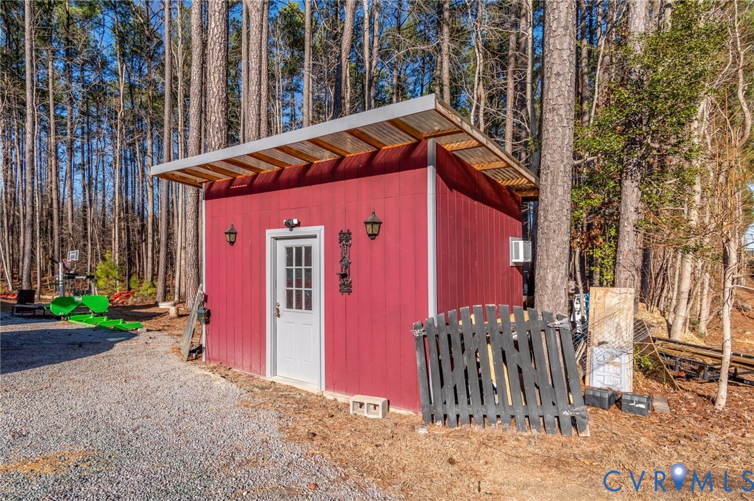 15330 Wilkinson Road Dinwiddie, VA 23841 - Photo 27 of 43 a front view of a house with a yard