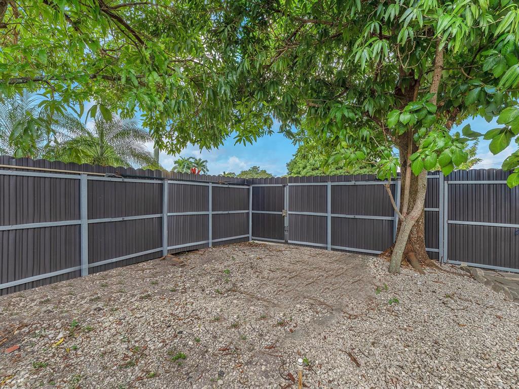 6631 Southwest 24th Street Miramar, FL 33023 - Photo 35 of 42 a view of a backyard